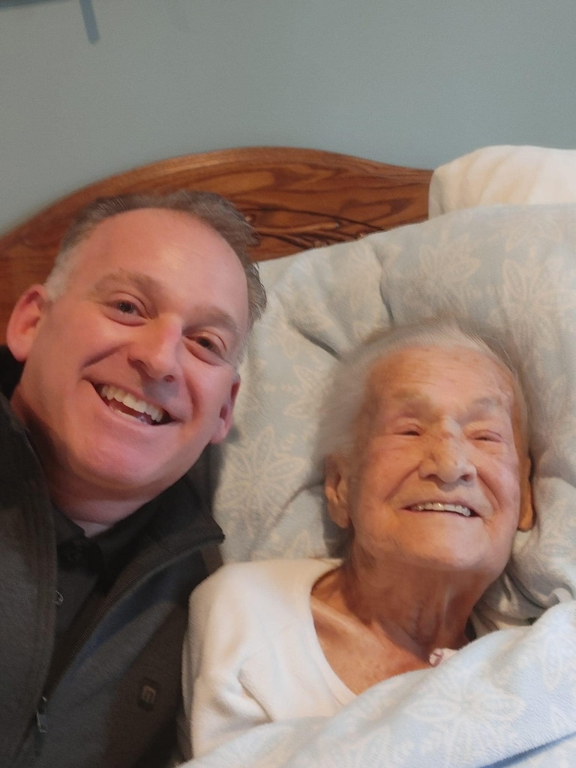 Dr. Vaccaro and Gigi smiling for a photo